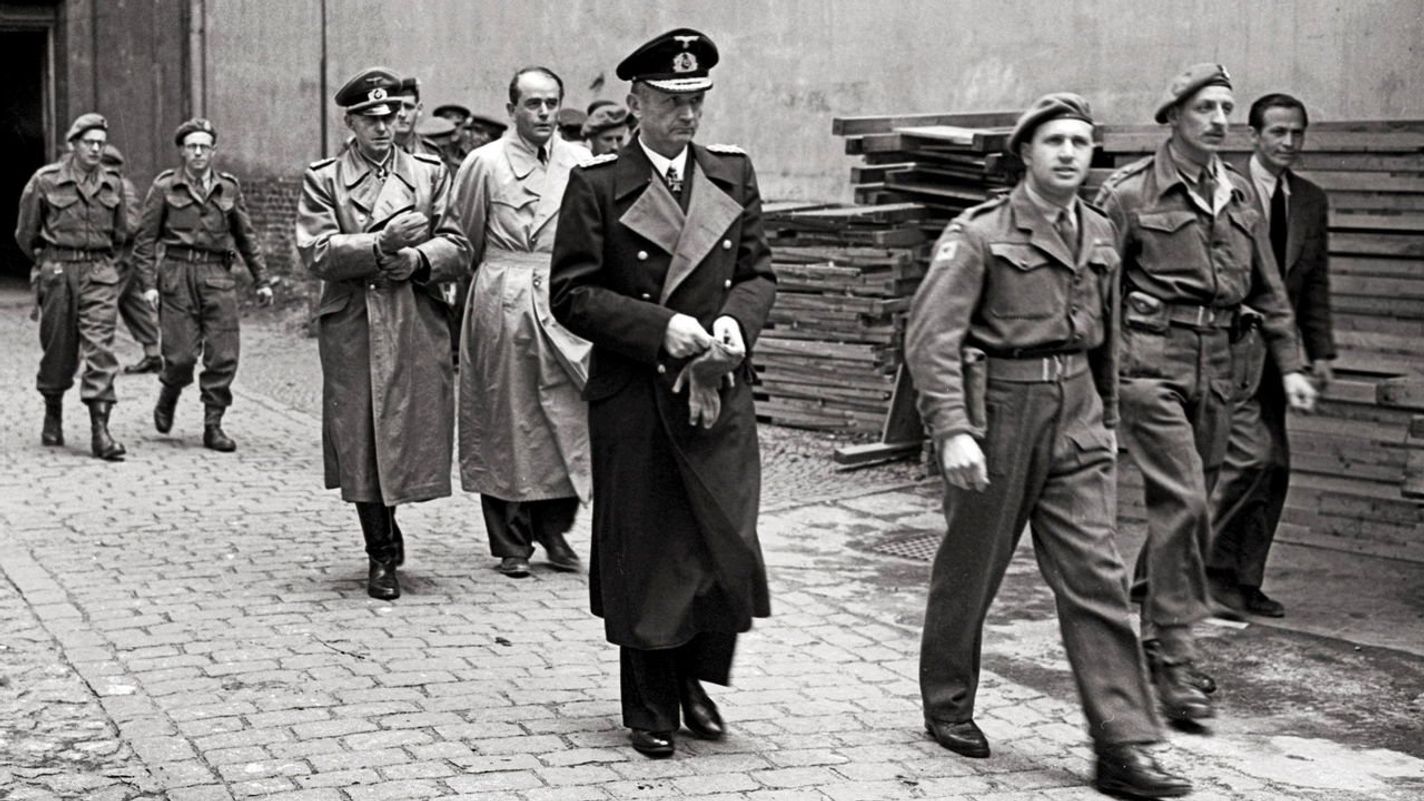 Admiral Karl Doenitz surrender and in custody along with Albert Speer May 1945, Germany's unconditional surrender to the allies. As Supreme Commander of the Navy beginning in 1943, Nazi Karl Doenitz played a major role in the naval history of World War II. He was briefly the last Fuhrer of the Third Reich, jailed for 10 years at the Nuremberg Trials and released in 1956