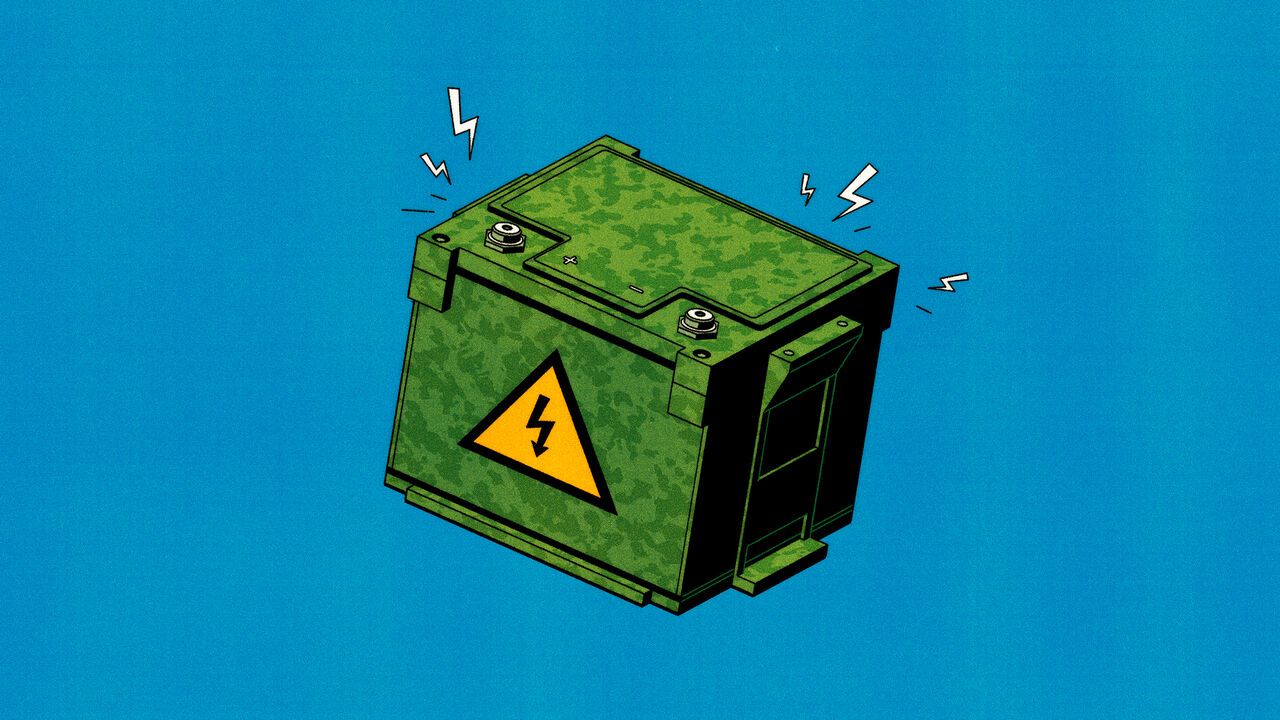 A vehicle battery with a camouflage pattern on it and sparks coming off it