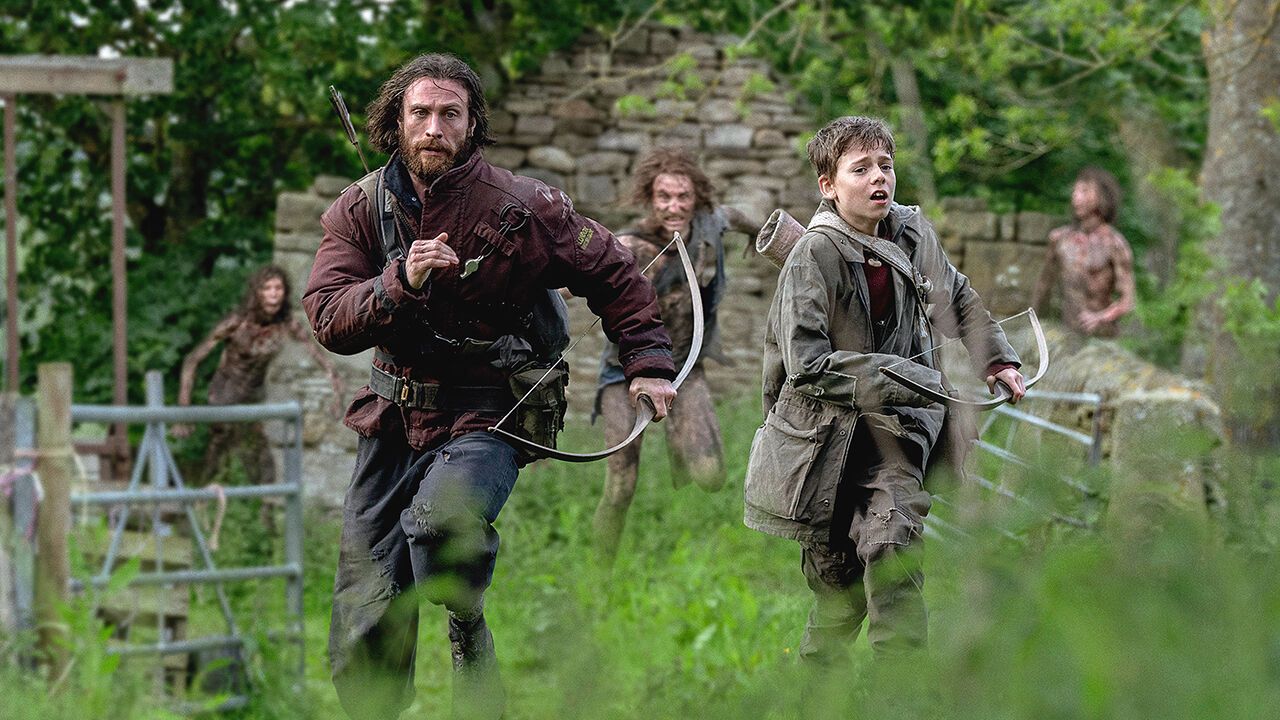 Aaron Taylor-Johnson and Alfie Williams in a scene from “28 Years Later” 