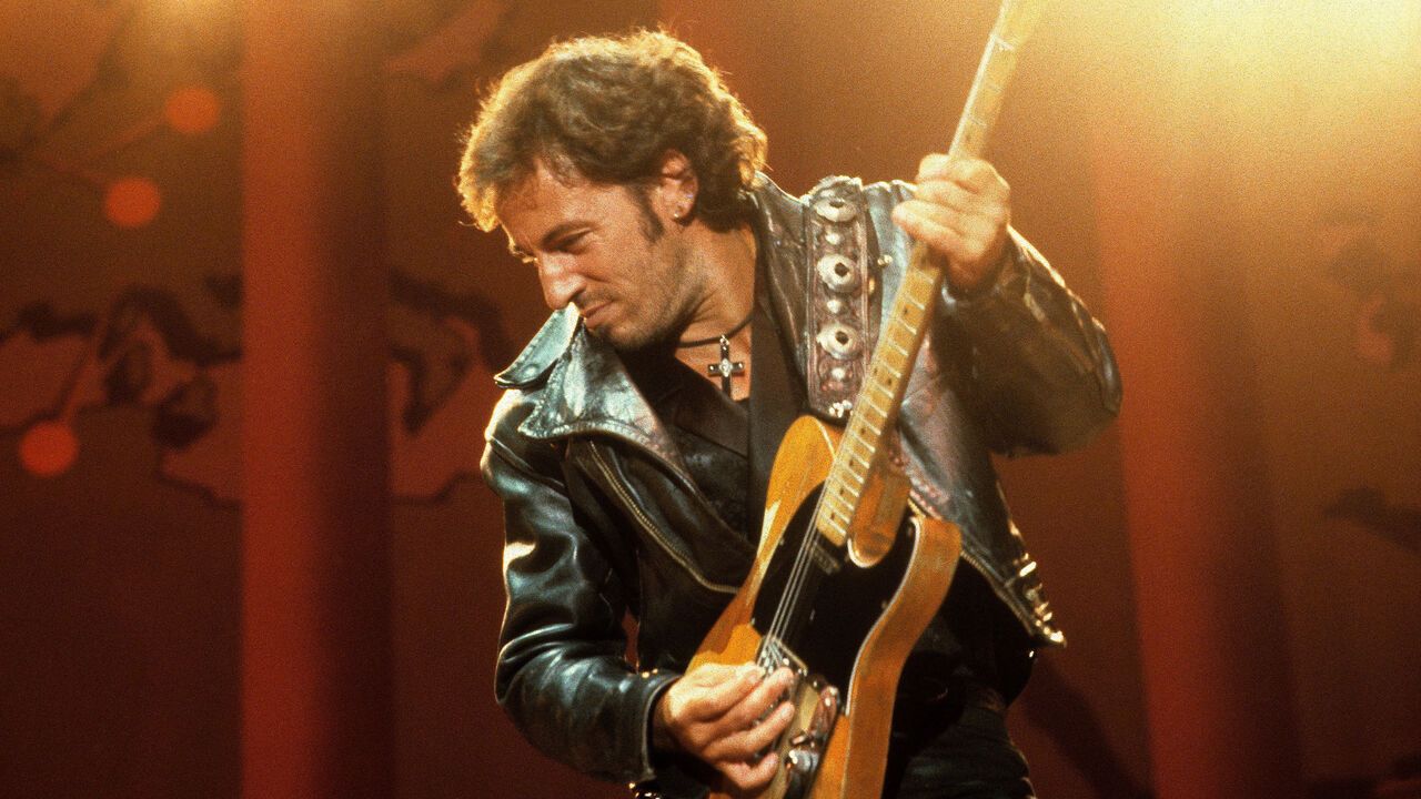 Bruce Springsteen performs on stage at an Amnesty International concert at Wembley Stadium, London, 2nd September 1988.