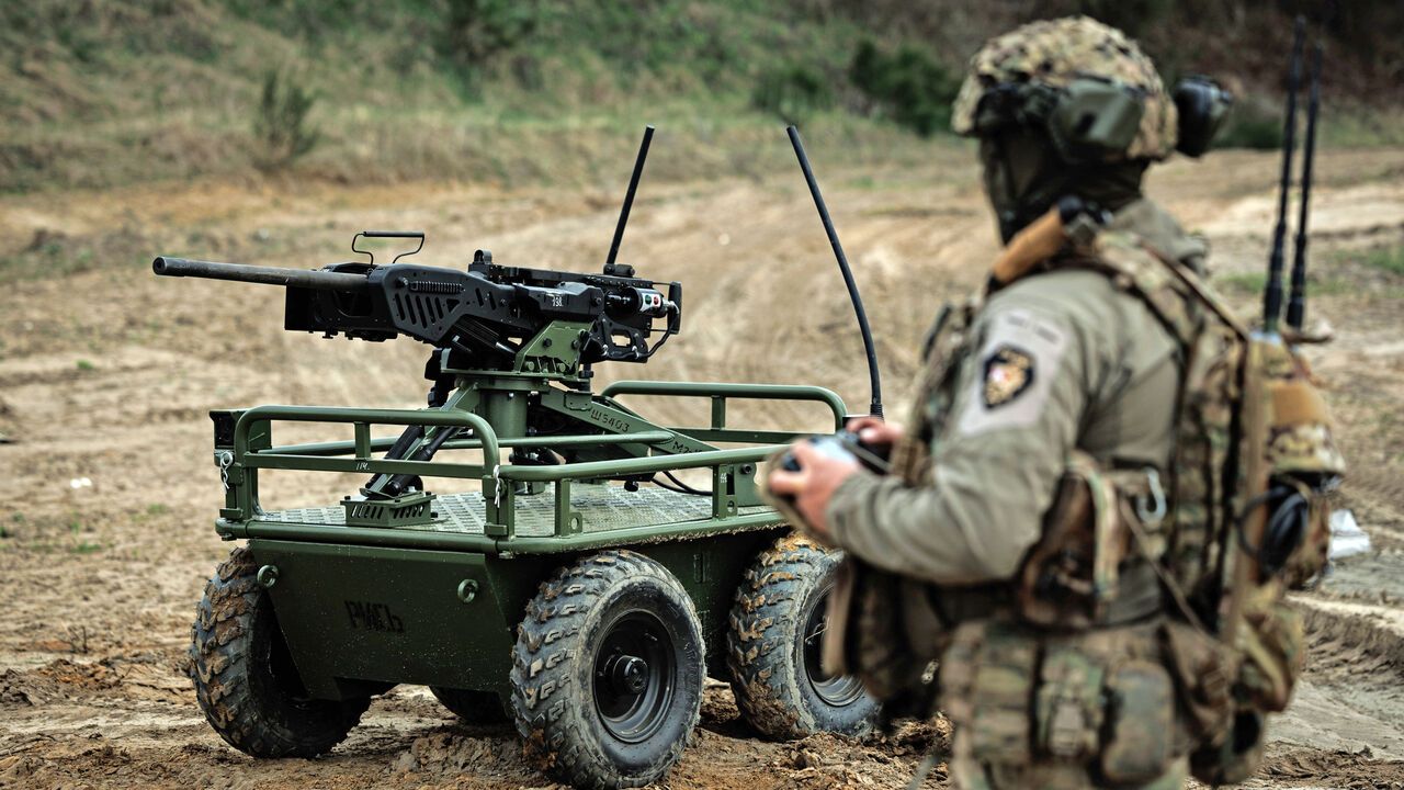 Ukrainian military control unmanned ground vehicle platform Rys Pro equipped with a remote-controlled machine-gun turret 