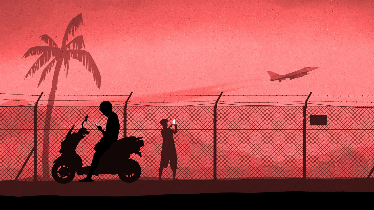 Illustration of the silhouettes of 2 young men, one on a moped and one standing, they're in front of the fence of a military base. The standing man is taking a photo of a fighter jet taking off, the one on the moped is on his phone. 