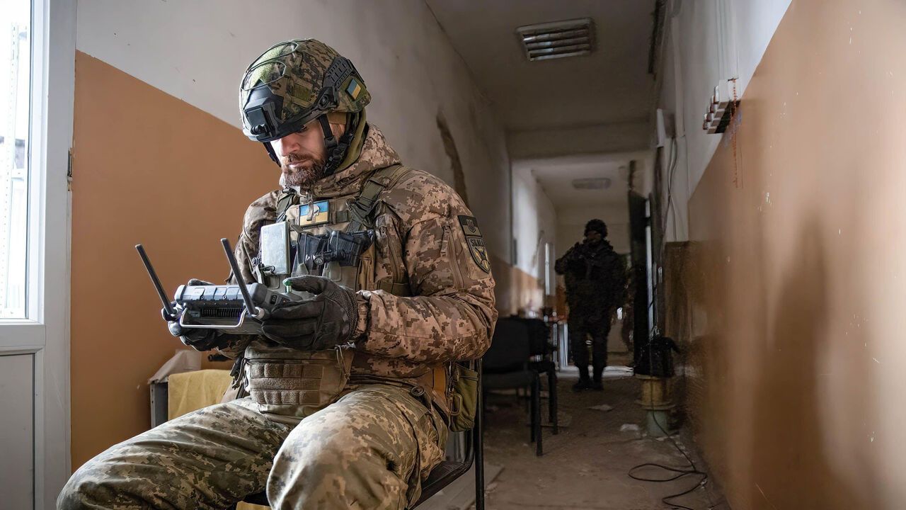 Ukrainian drone operator works to correct artillery fire in the city of Bahkmut.