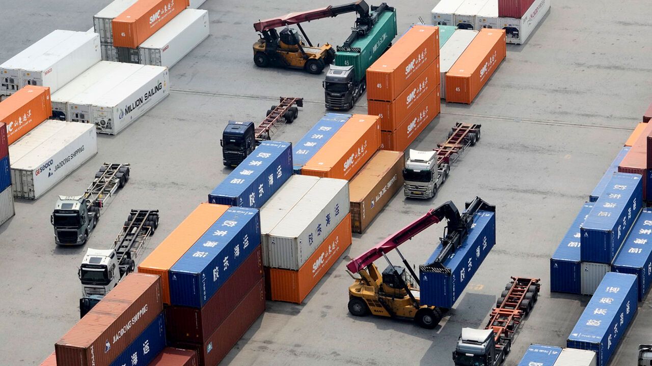 Cranes and shipping containers at a port in Pyeongtaek, South Korea